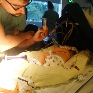 Dan giving Jax his feed