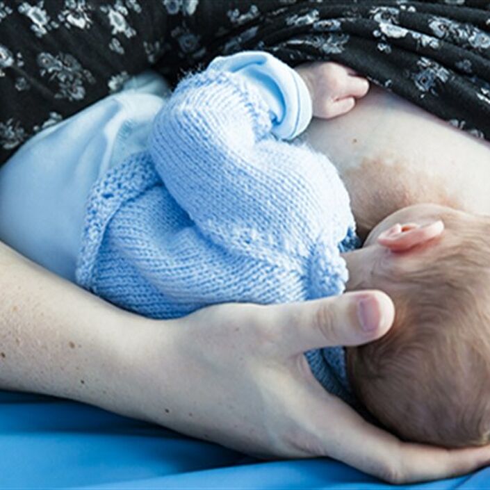 Mother breastfeeding her baby