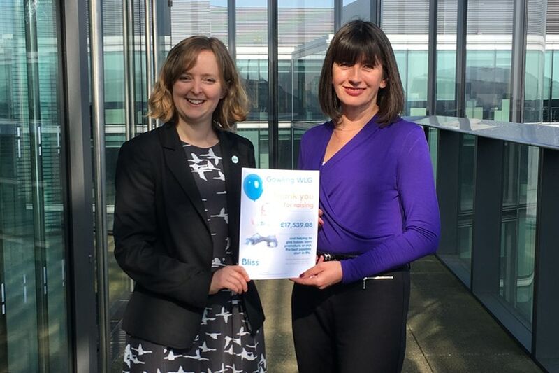 Presenting certificate of money raised for Bliss