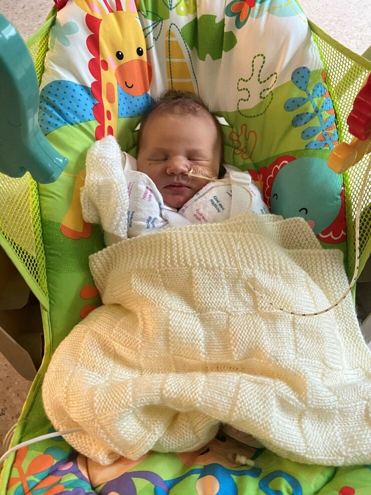 Heidi wrapped in blankets