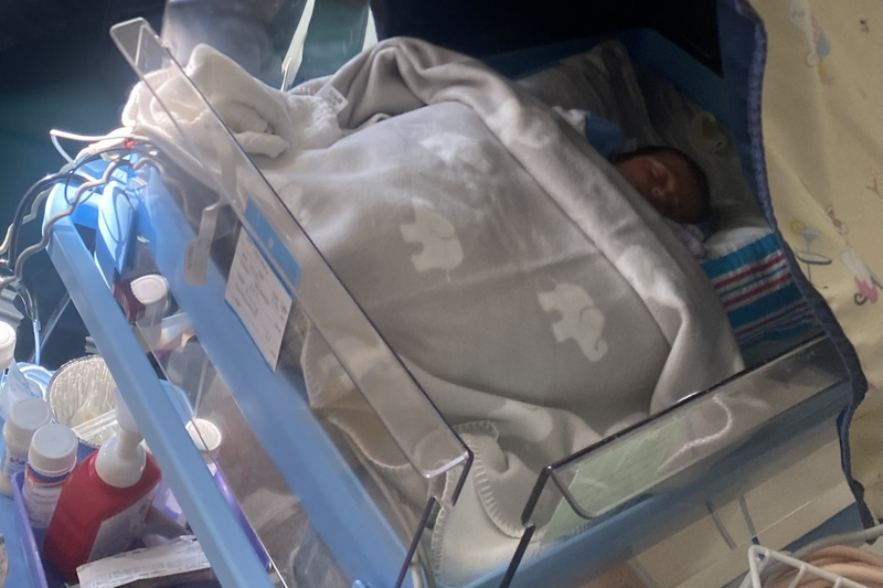 Iram's baby Adam in an incubator on the neonatal unit
