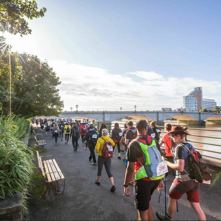 walking alongside the thames near sunset
