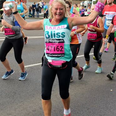 Bliss female fundraiser running the Great North Run