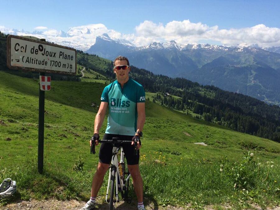 Bliss cyclist at a mountain pass