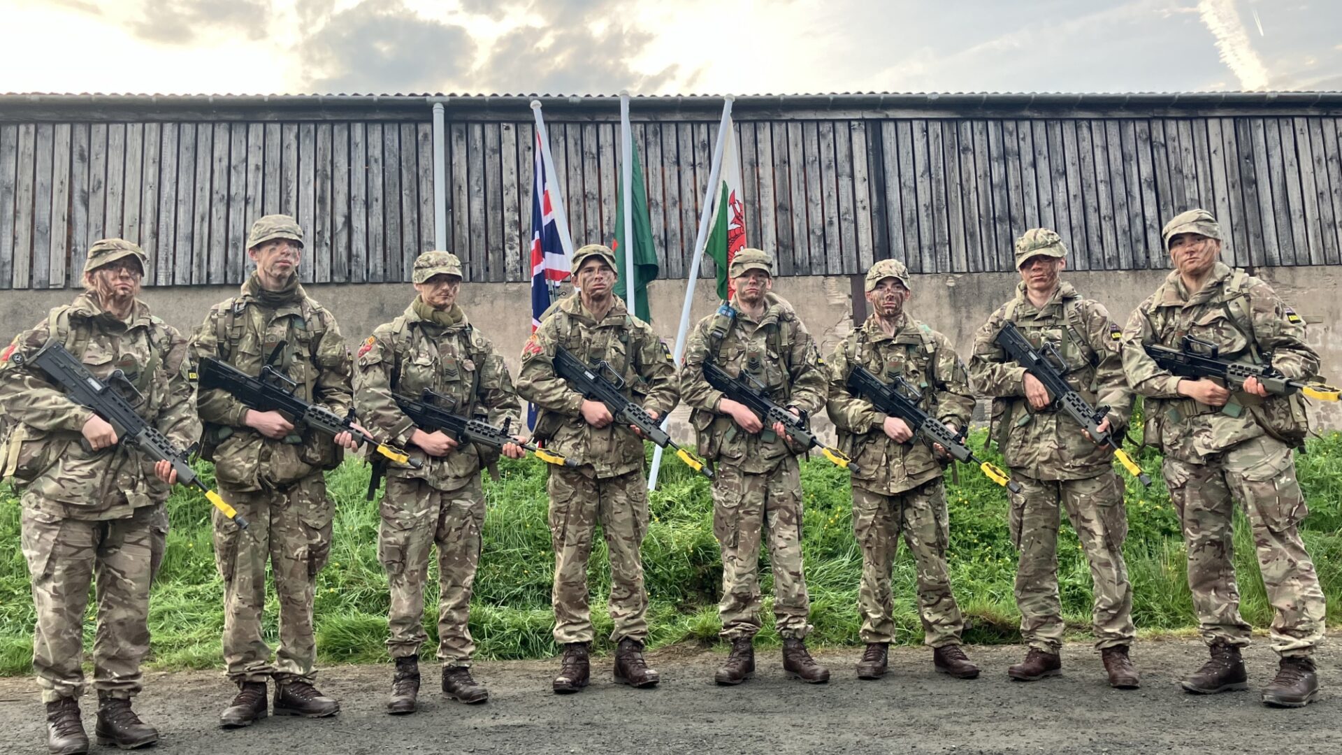 Cadet Team from Caterham School posing with their weapons