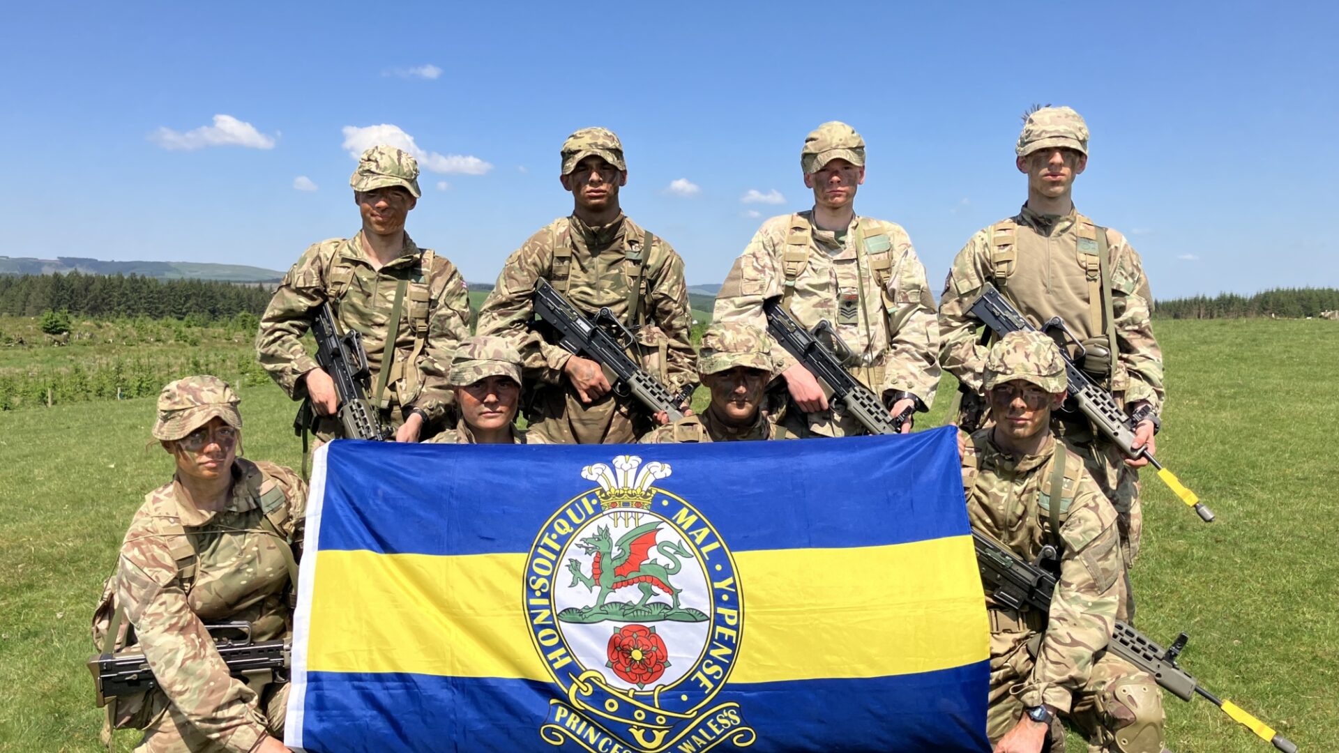 Caterham school posing with flag