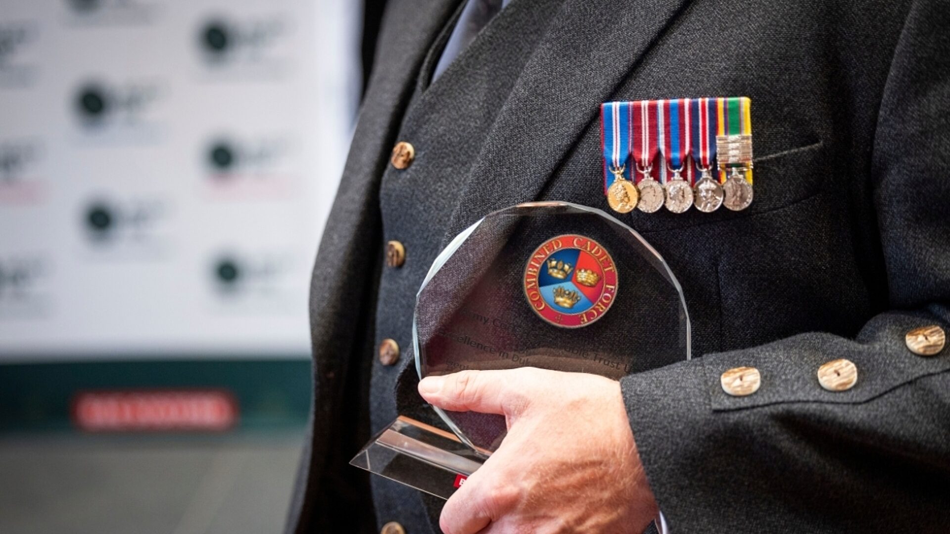 Man holding CCFA award