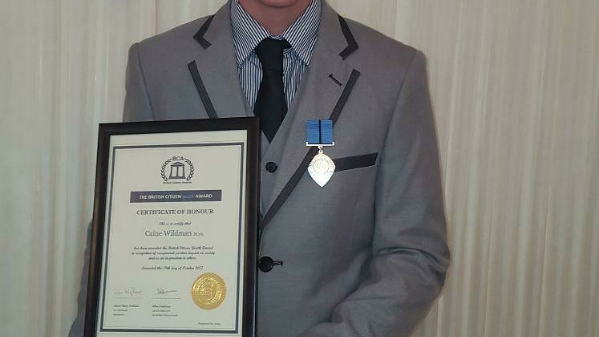 Caine receiving his award 1