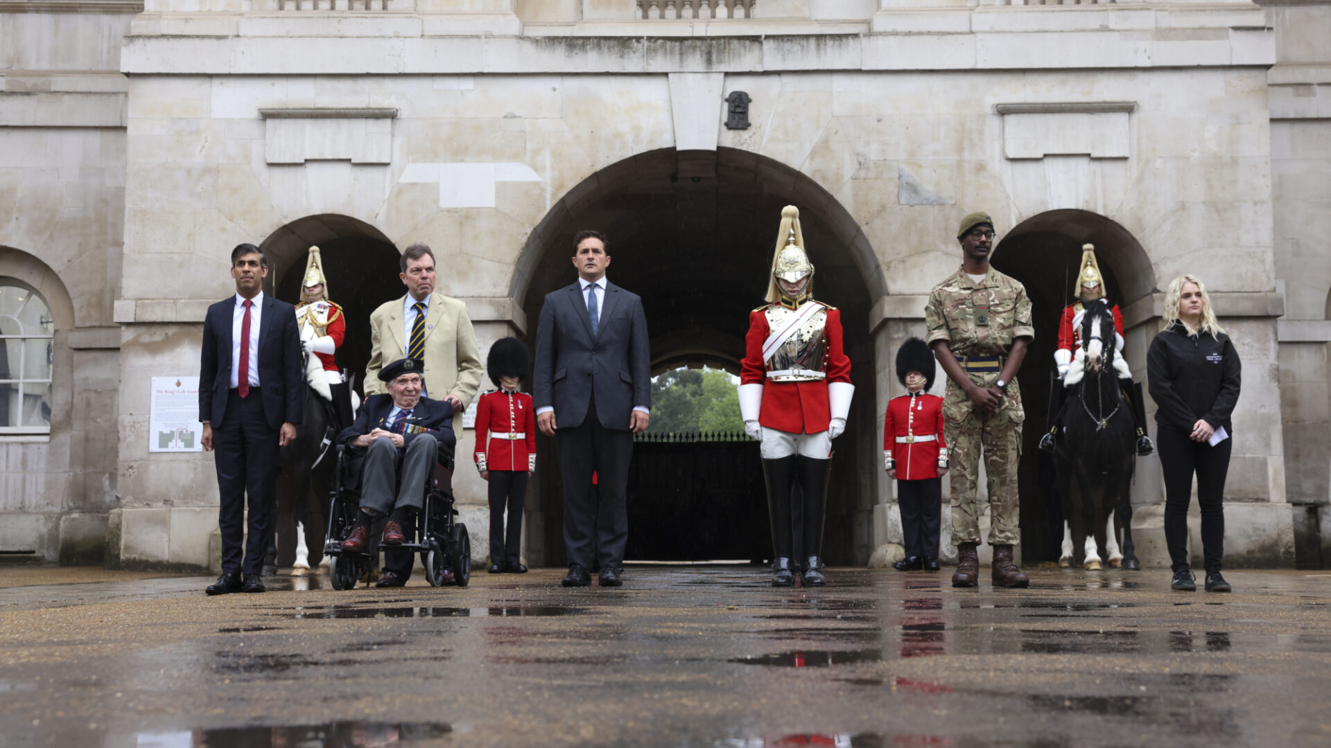 Various members of the D Day Torch of Remembrance Ceremony