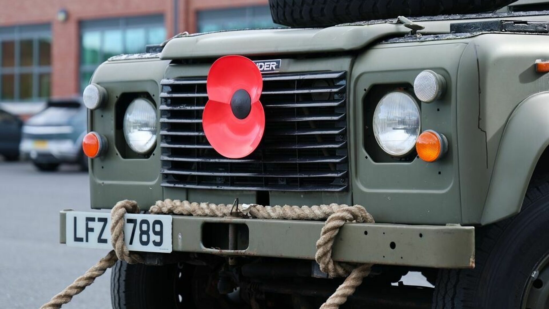 Land Rover with a poppy