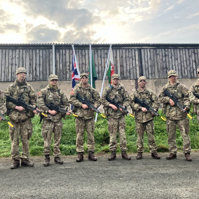 Cadet Team from Caterham School posing with their weapons