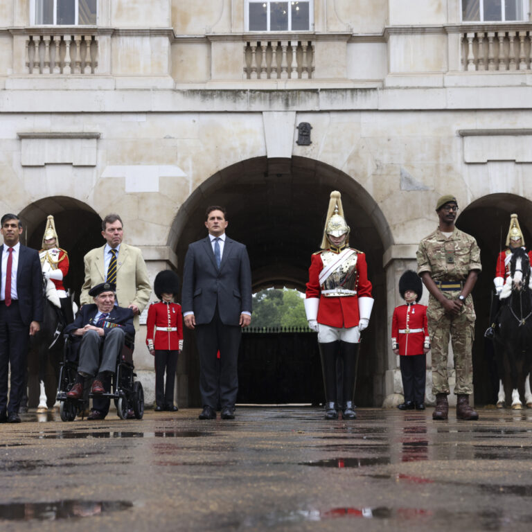 Various members of the D Day Torch of Remembrance Ceremony