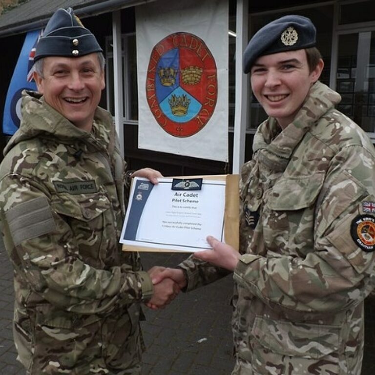 Flt Sgt Gibbs being officially presented with his Air Cadet Pilot Scheme by Air Commodore Bentley at our recent Biannual small 1