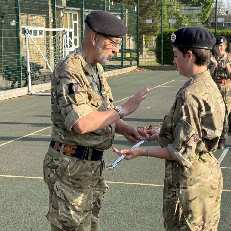 Brigadier on parade inspection with cadets