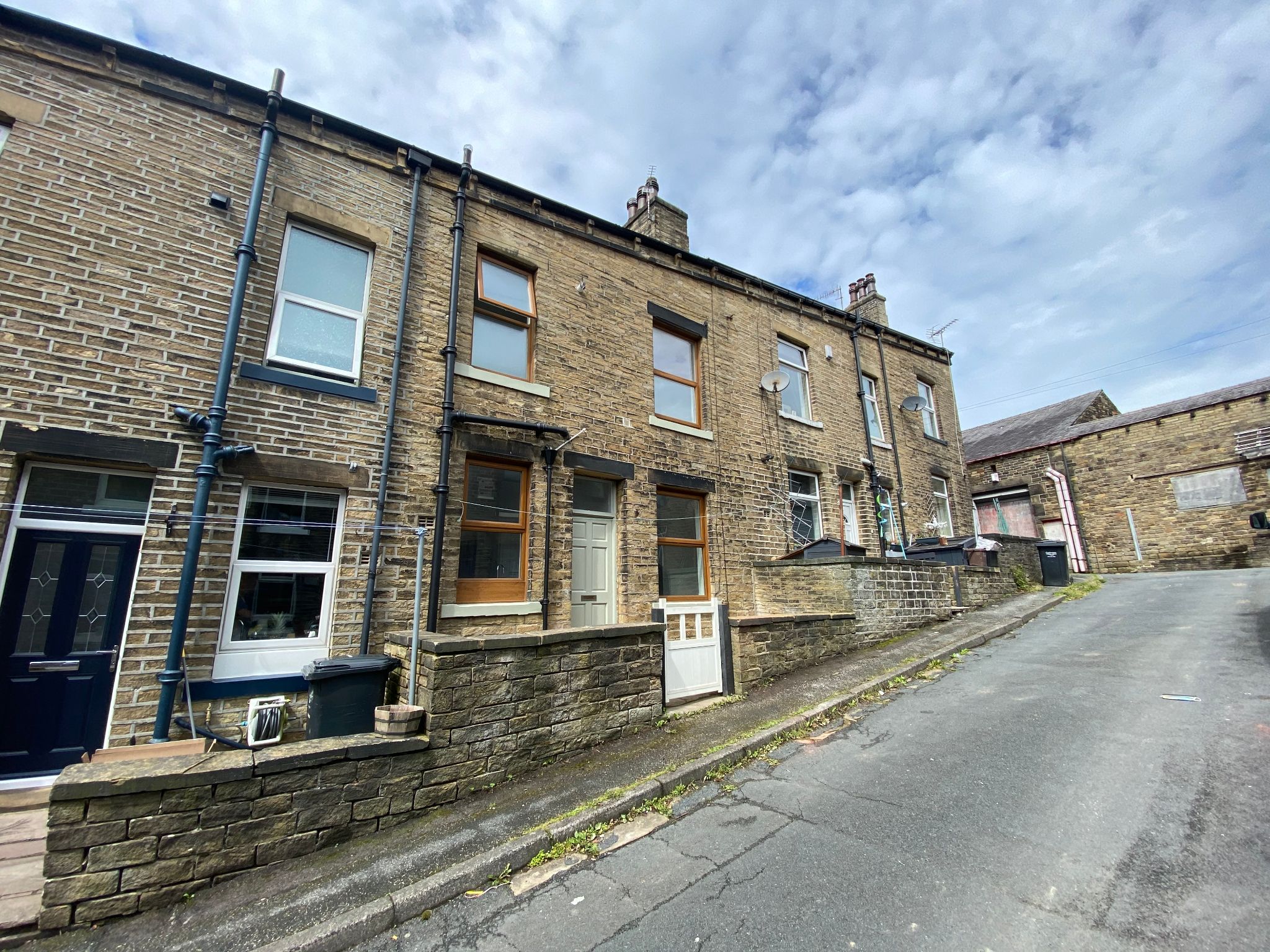 2 bedroom mid terraced house To Let in Mytholmroyd - Photograph 1