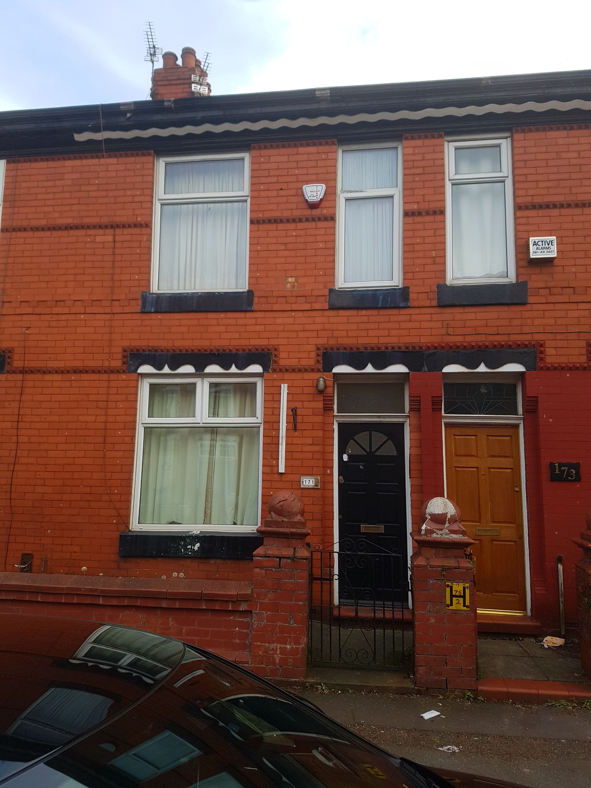 2 bedroom mid terraced house SSTC in Manchester - Photograph 1.