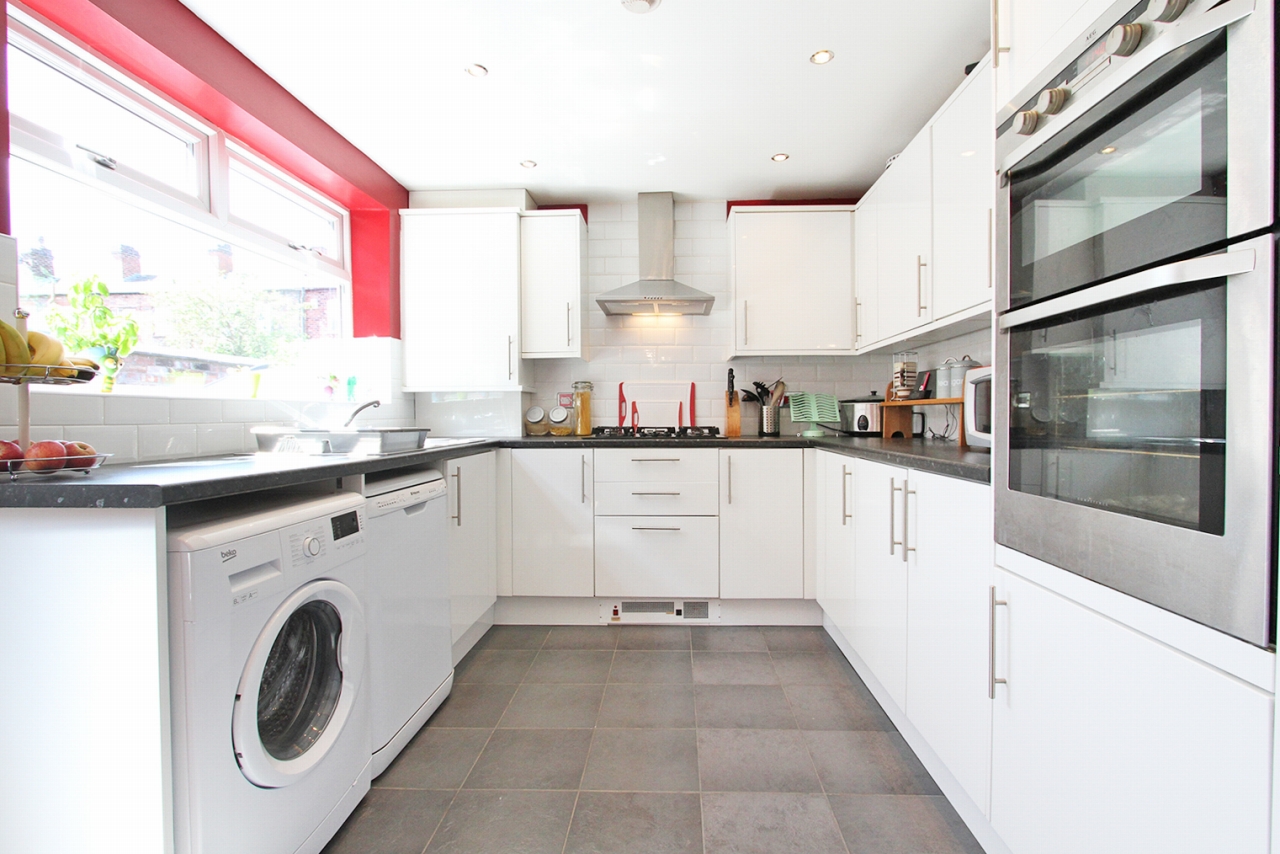 3 bedroom mid terraced house SSTC in Wigan - Photograph 1