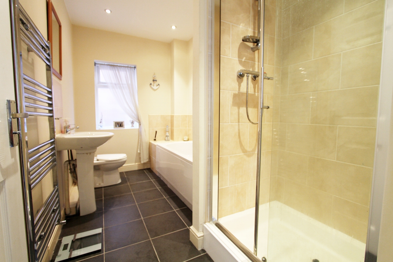 3 bedroom mid terraced house SSTC in Wigan - Photograph 5