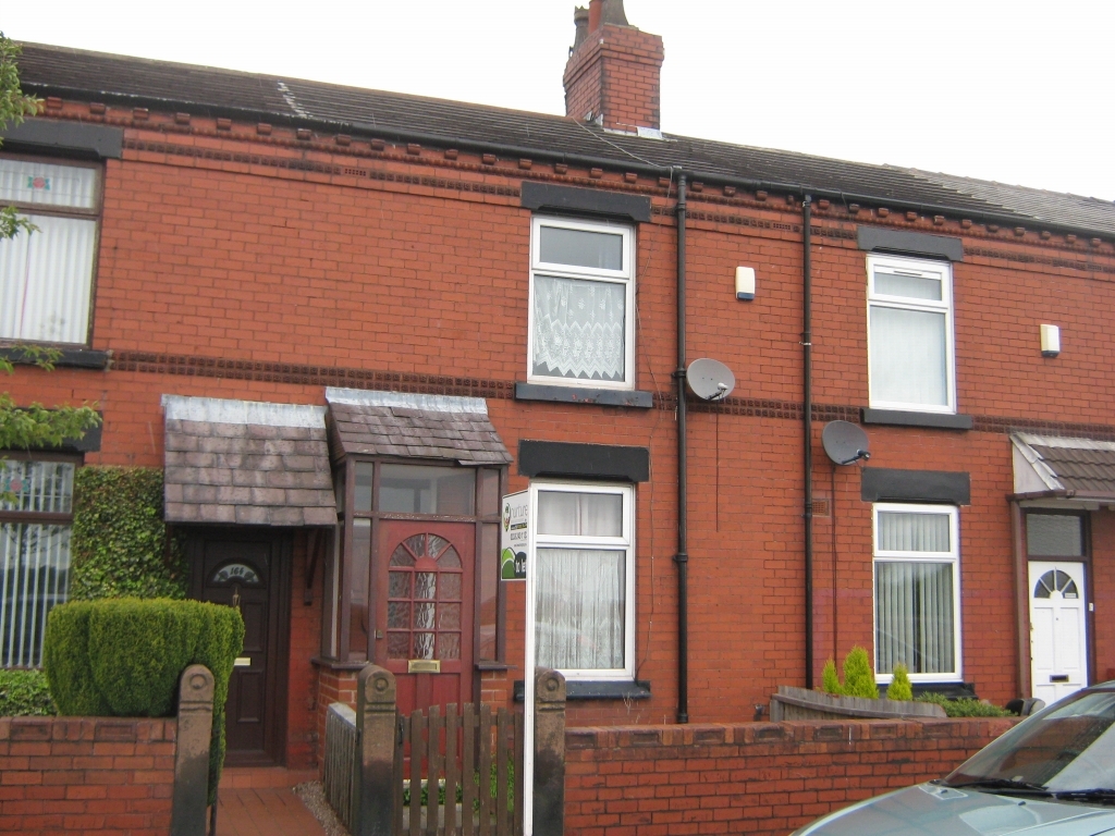 2 bedroom mid terraced house To Let in St Helens - Front