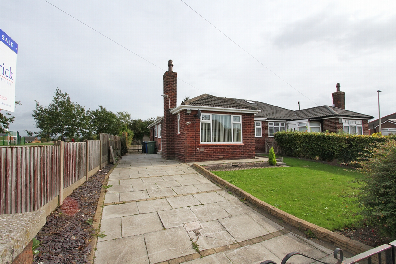3 bedroom detached bungalow Sold in Wigan - Photograph 1