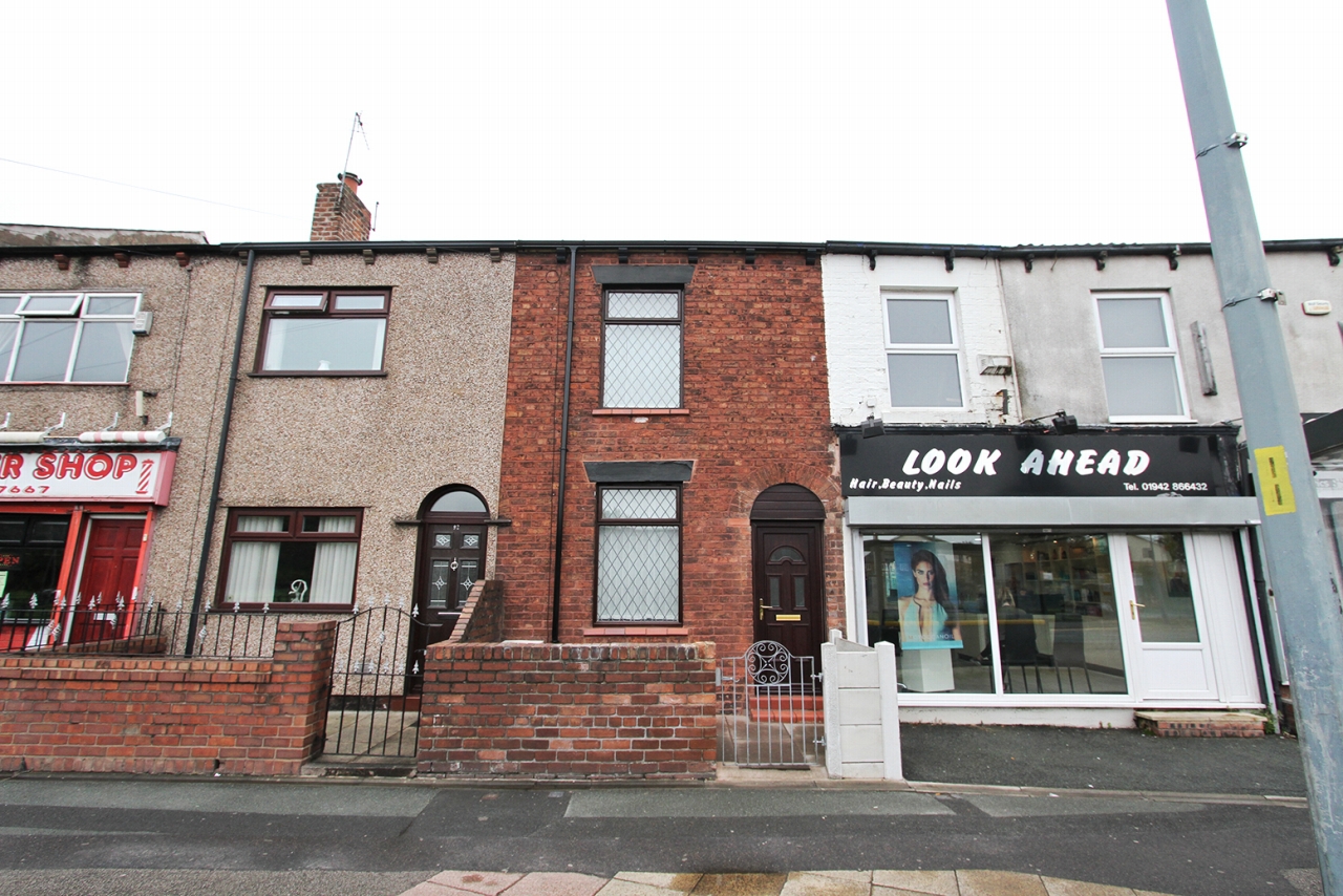 2 bedroom mid terraced house For Sale in Wigan - Photograph 1