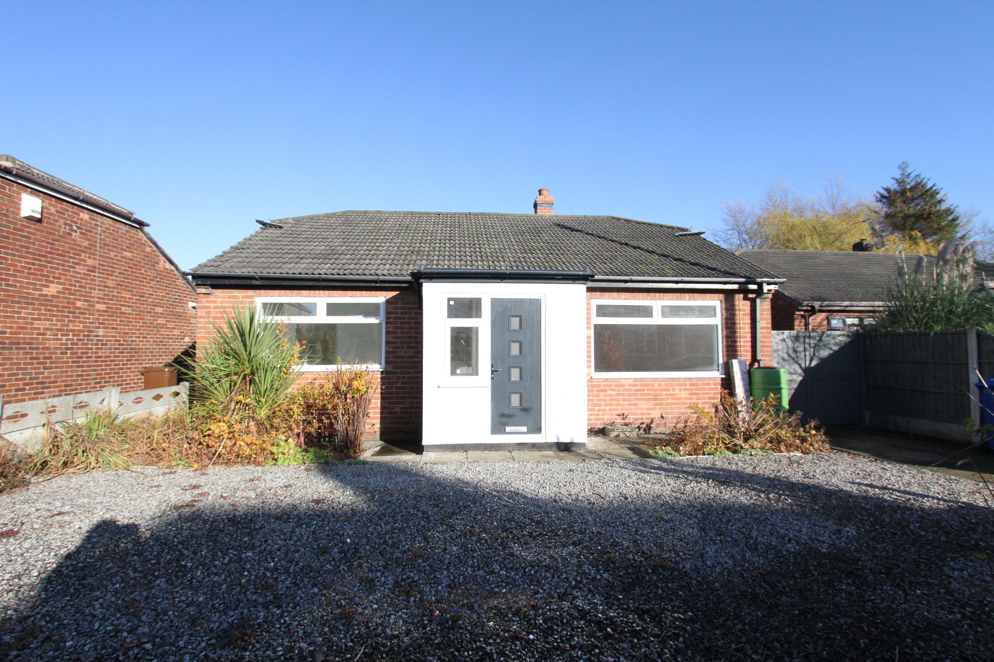 3 bedroom detached bungalow To Let in Wigan - Front