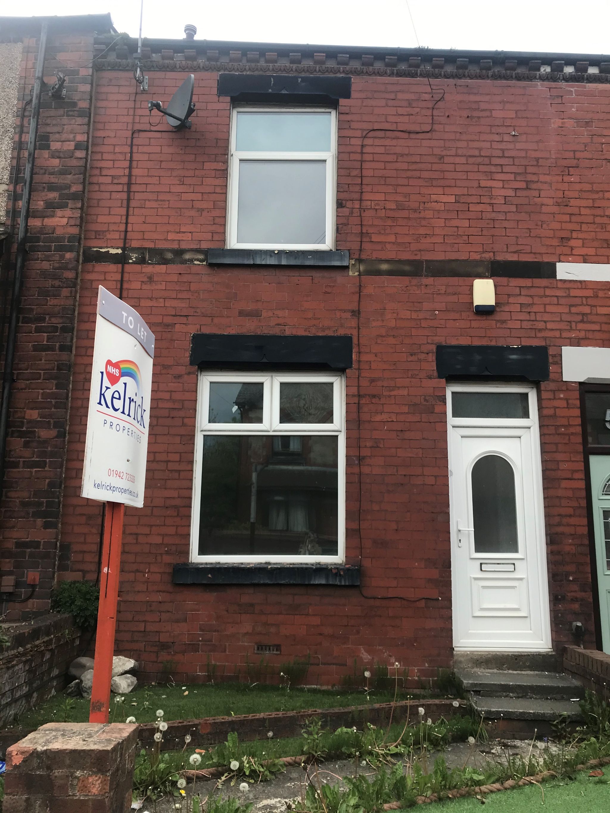 2 bedroom mid terraced house Let in Wigan - Photograph 1