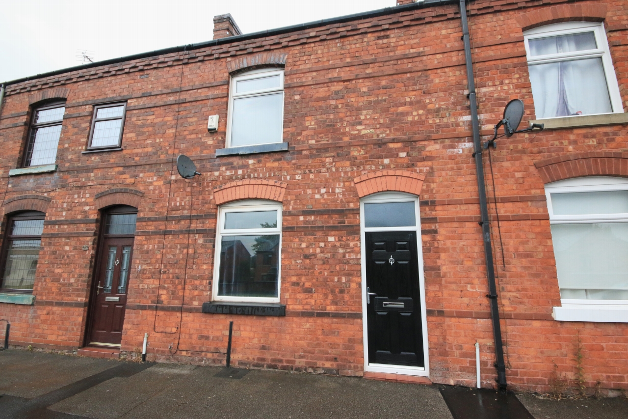 2 Bed Mid Terraced House - Photograph 1