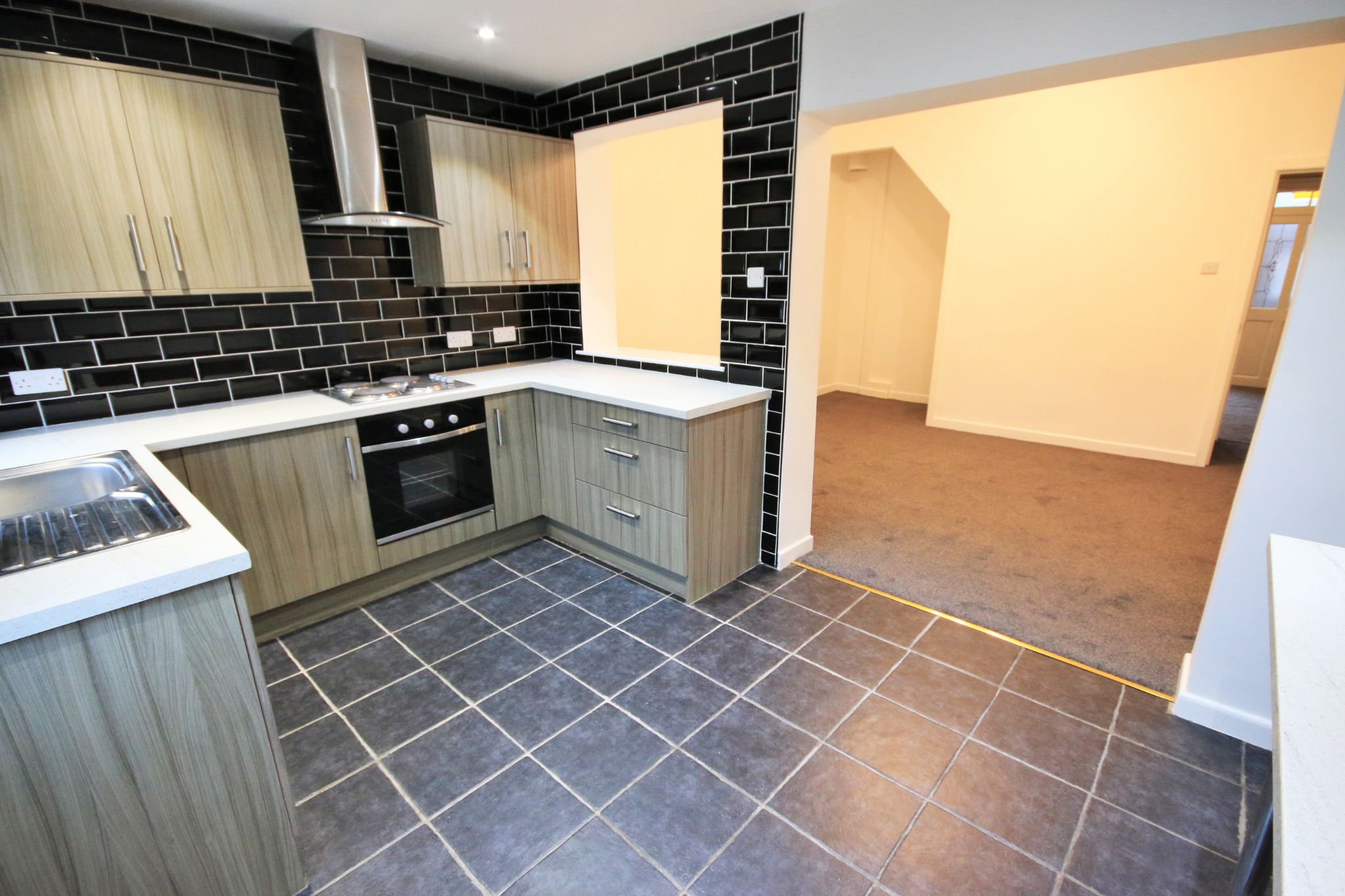 2 bedroom mid terraced house To Let in Wigan - Photograph 5.