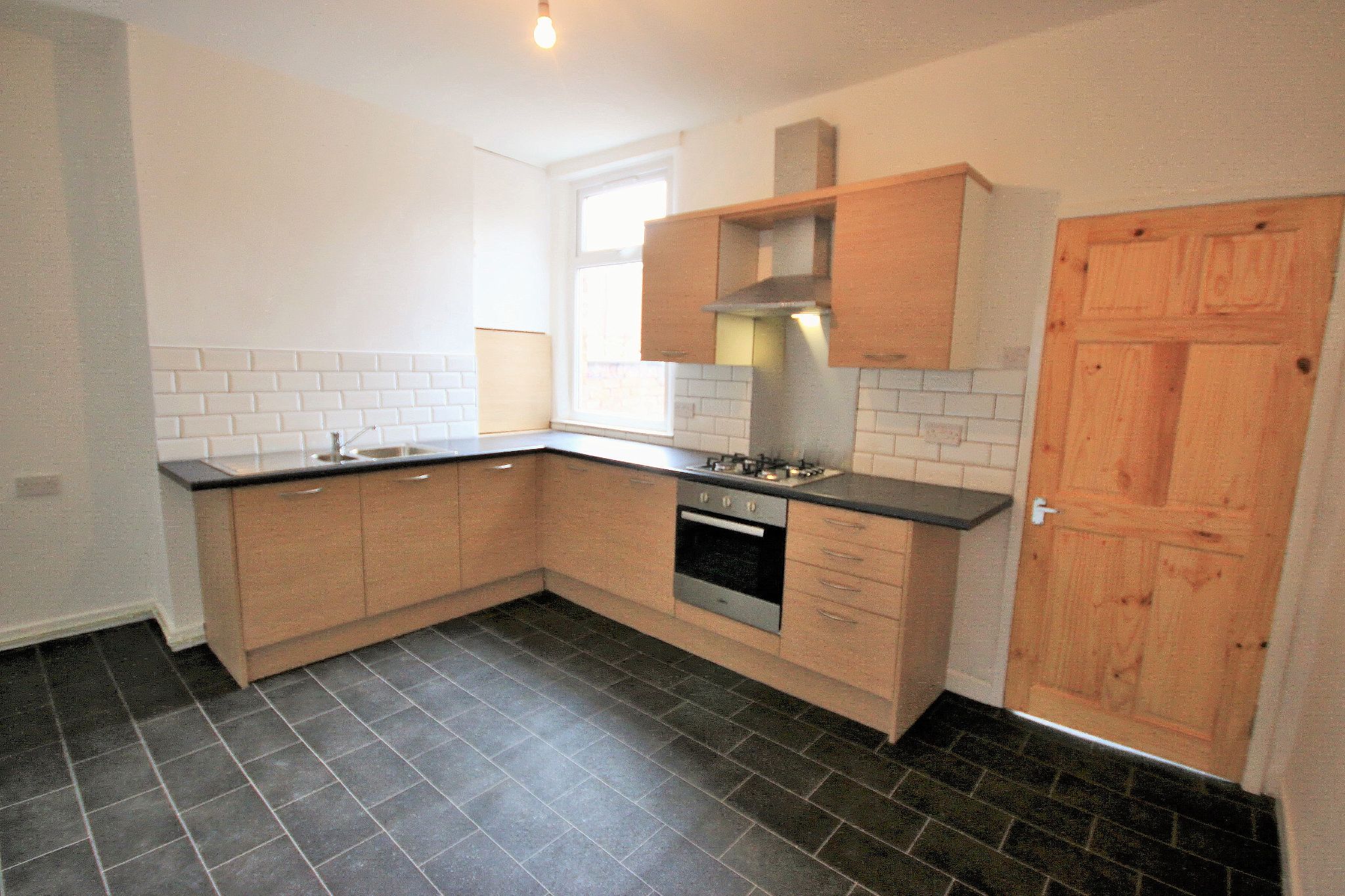 2 bedroom mid terraced house SSTC in Wigan - Photograph 3.