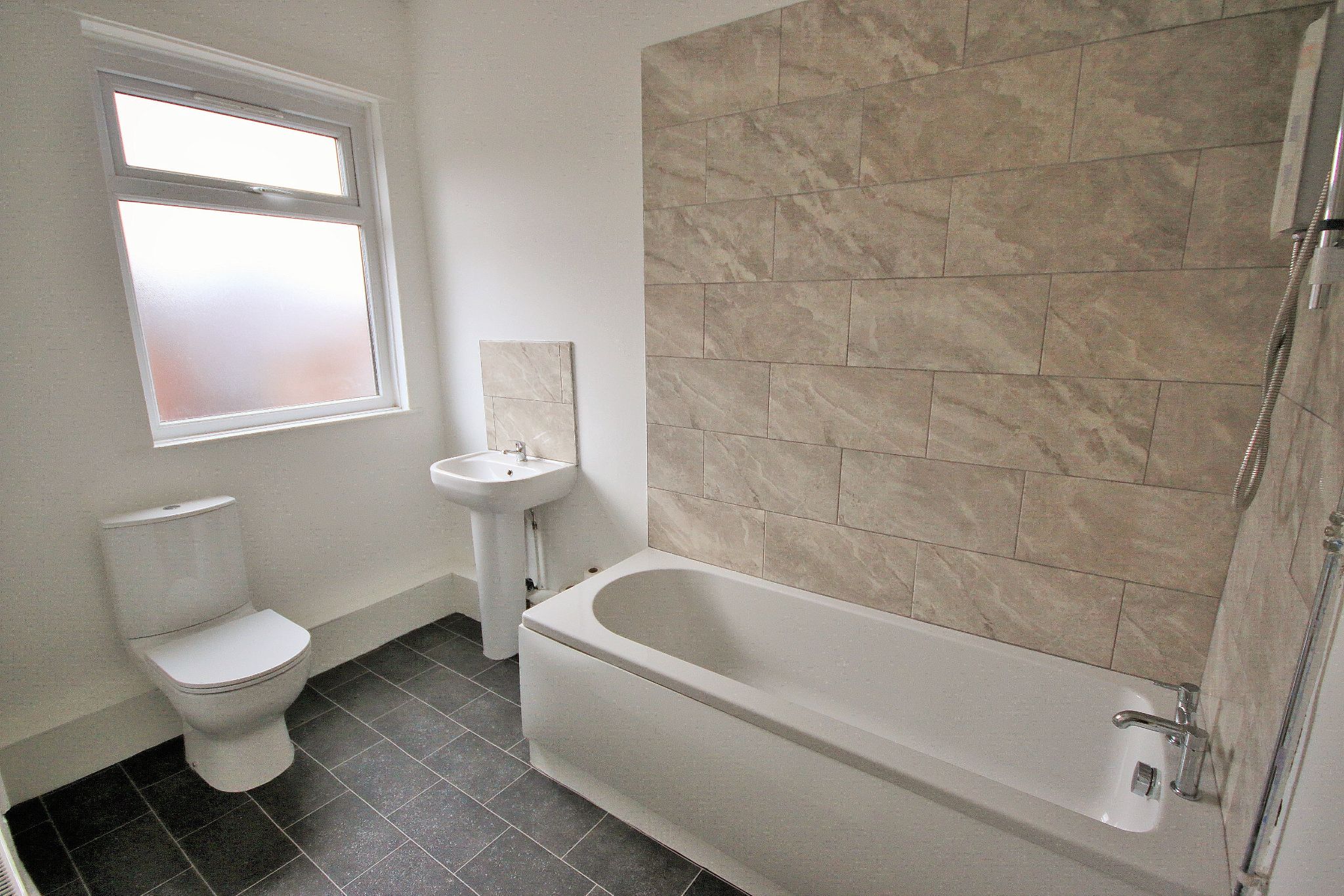 2 bedroom mid terraced house SSTC in Wigan - Photograph 8.
