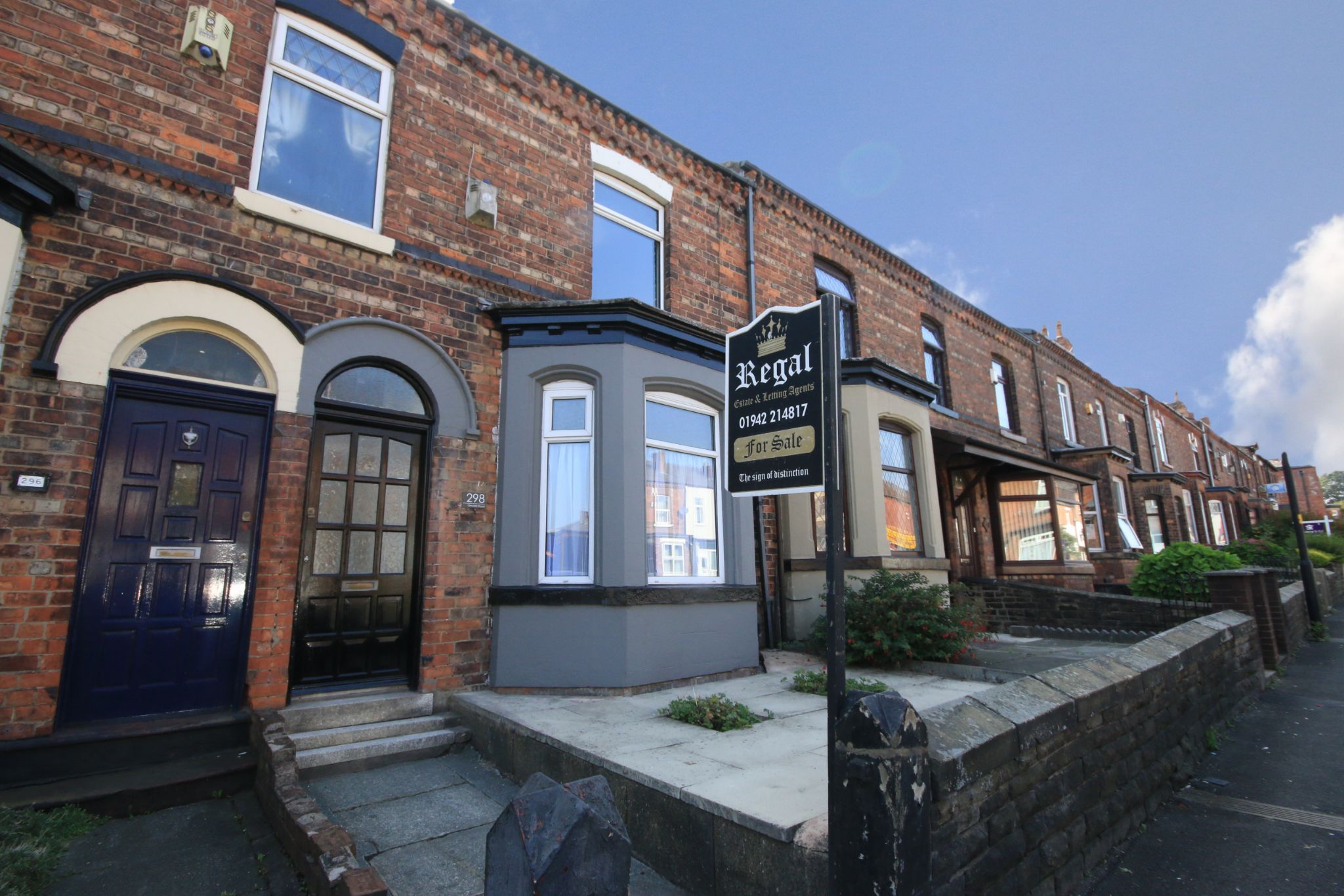 3 bedroom mid terraced house For Sale in Wigan - Photograph 1.