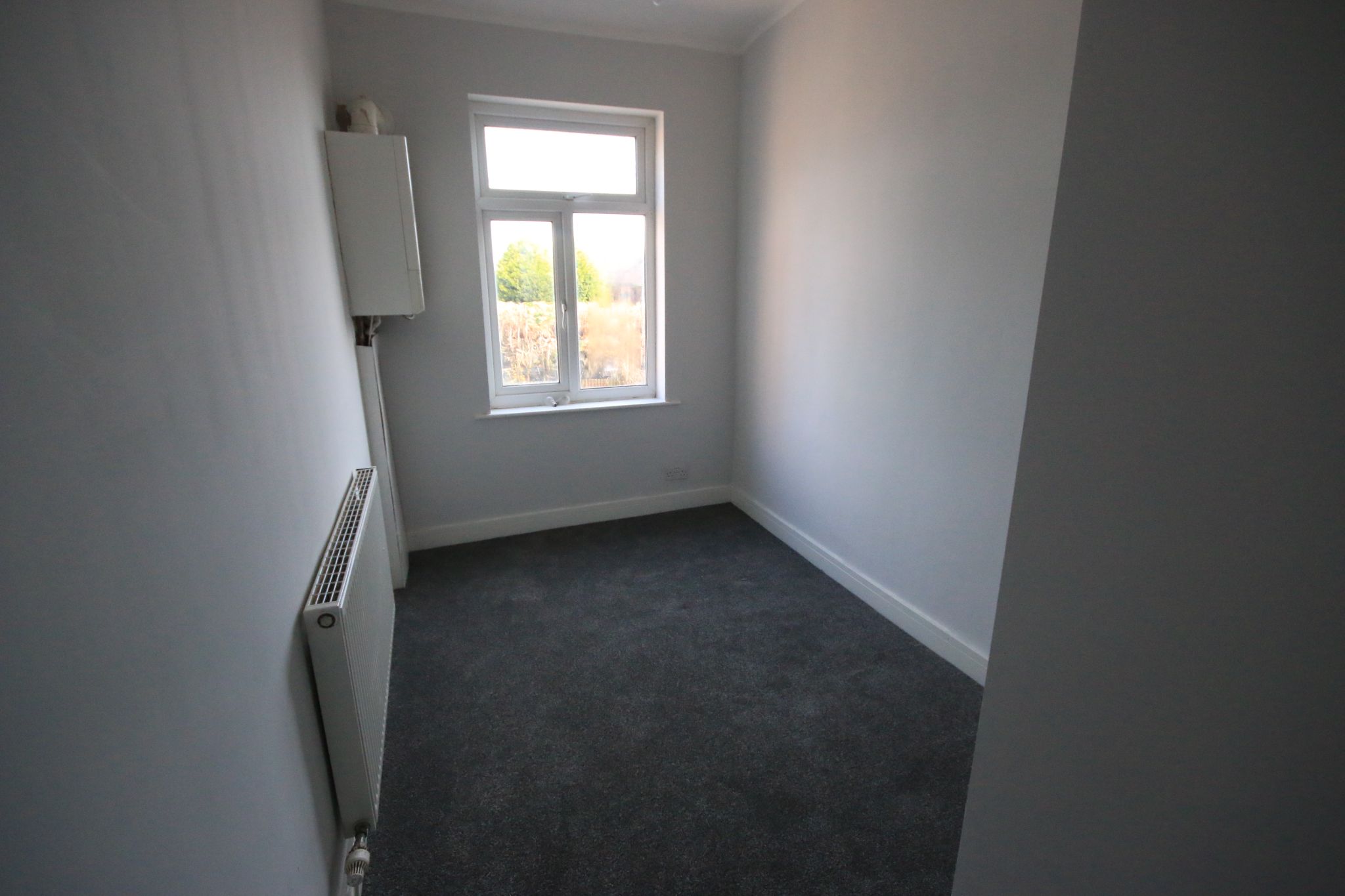 3 bedroom mid terraced house To Let in Wigan - Property photograph.