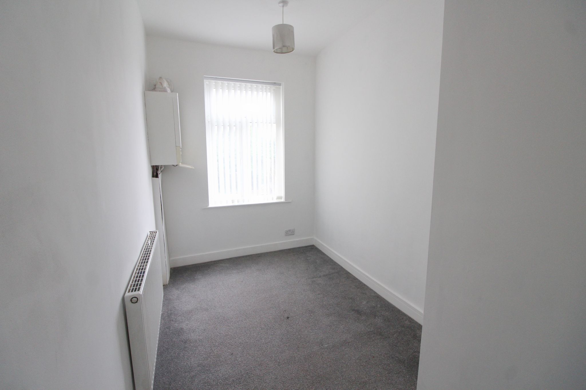 3 bedroom mid terraced house To Let in Wigan - Photograph 12.
