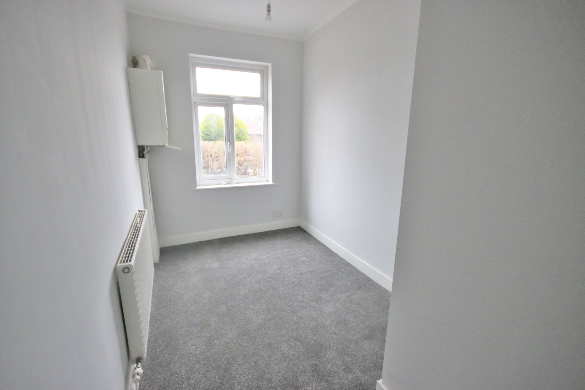 3 bedroom mid terraced house To Let in Wigan - Photograph 11.