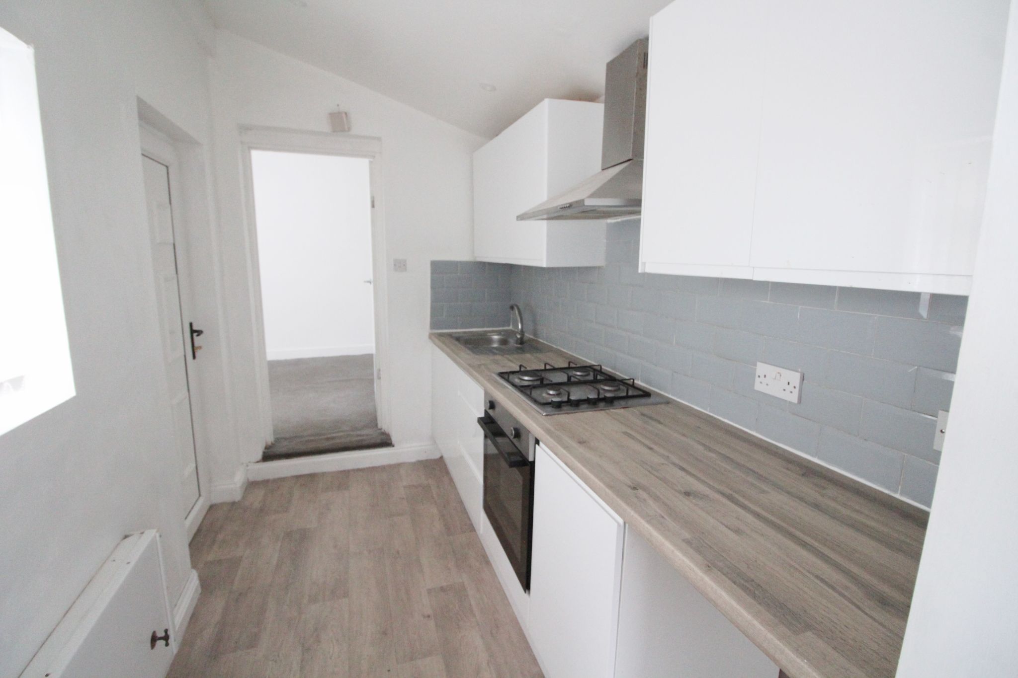 3 bedroom mid terraced house To Let in Wigan - Photograph 7.