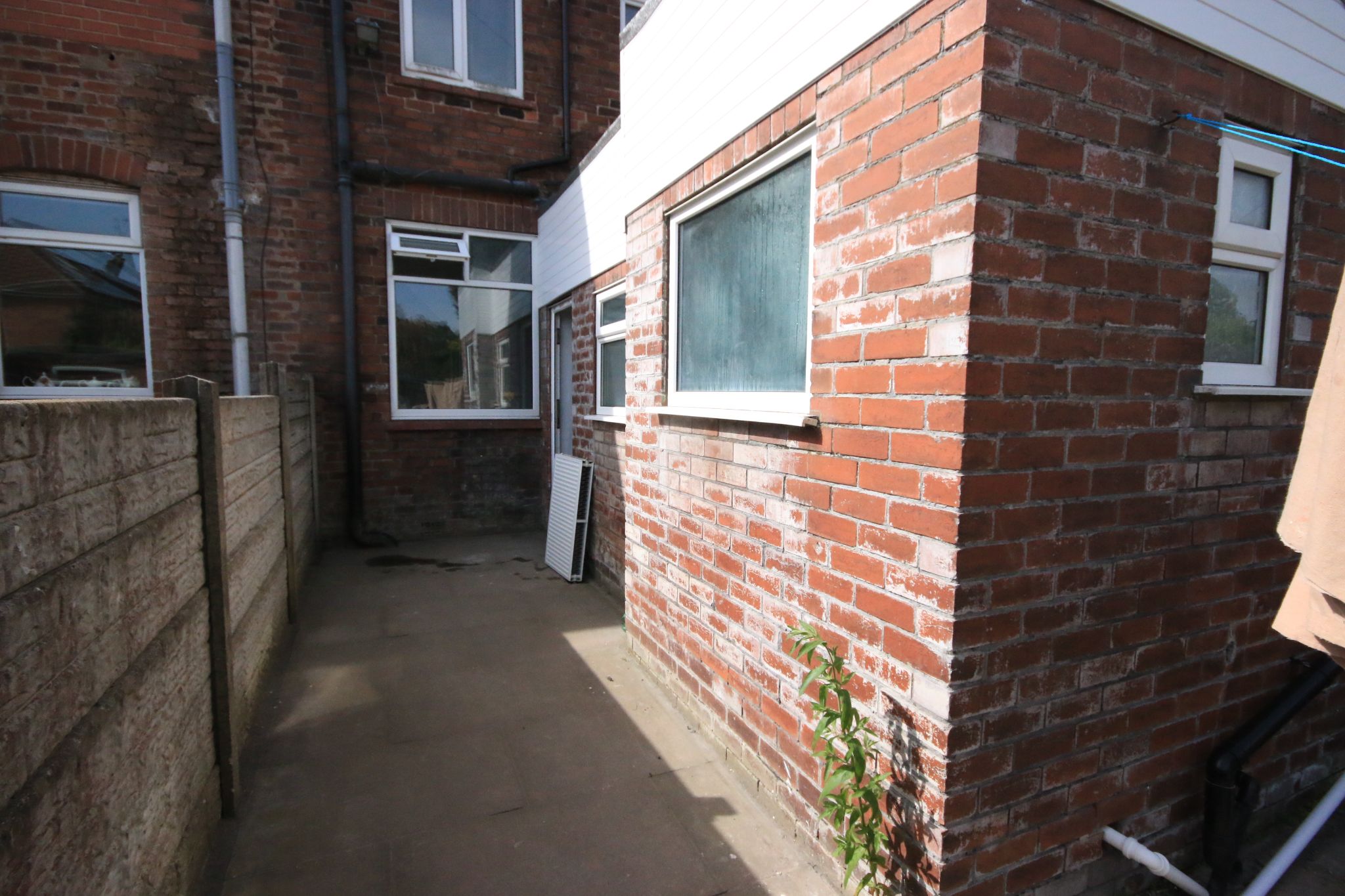 3 bedroom mid terraced house To Let in Wigan - Photograph 3.