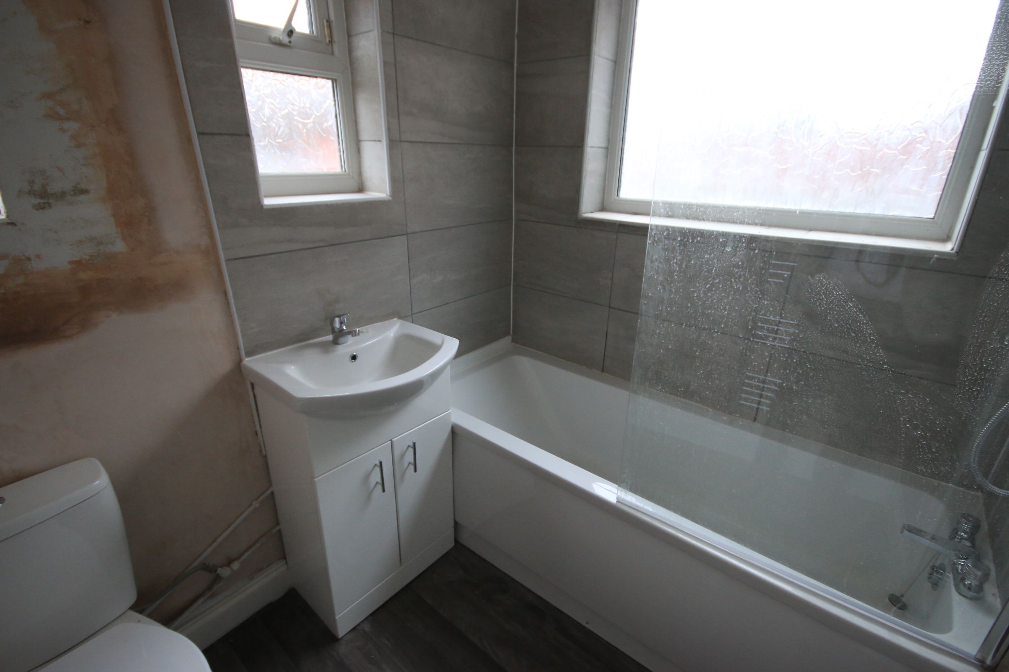 3 bedroom mid terraced house To Let in Wigan - Photograph 8.