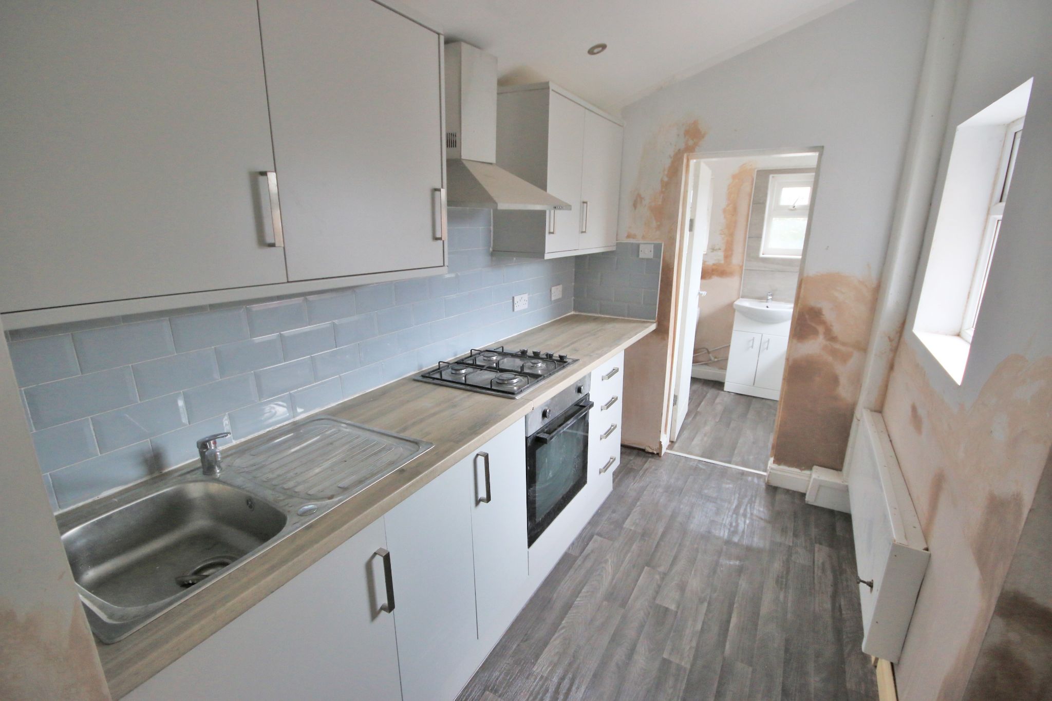 3 bedroom mid terraced house To Let in Wigan - Photograph 6.