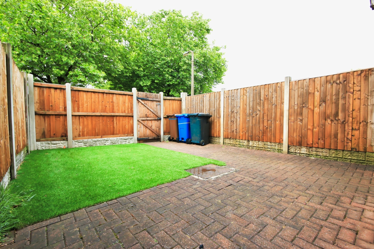3 bedroom mid terraced house Sold in Wigan - Photograph 2.