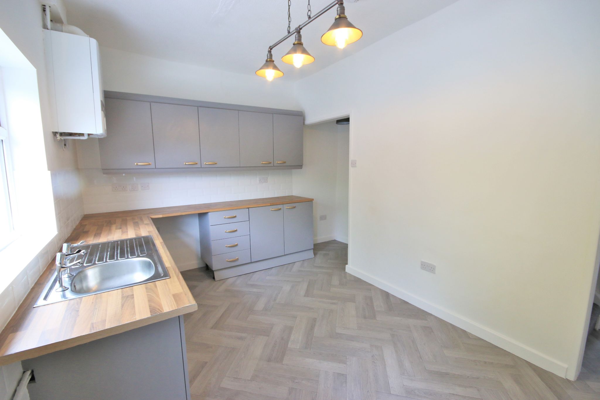 2 bedroom mid terraced house To Let in Wigan - Photograph 4.