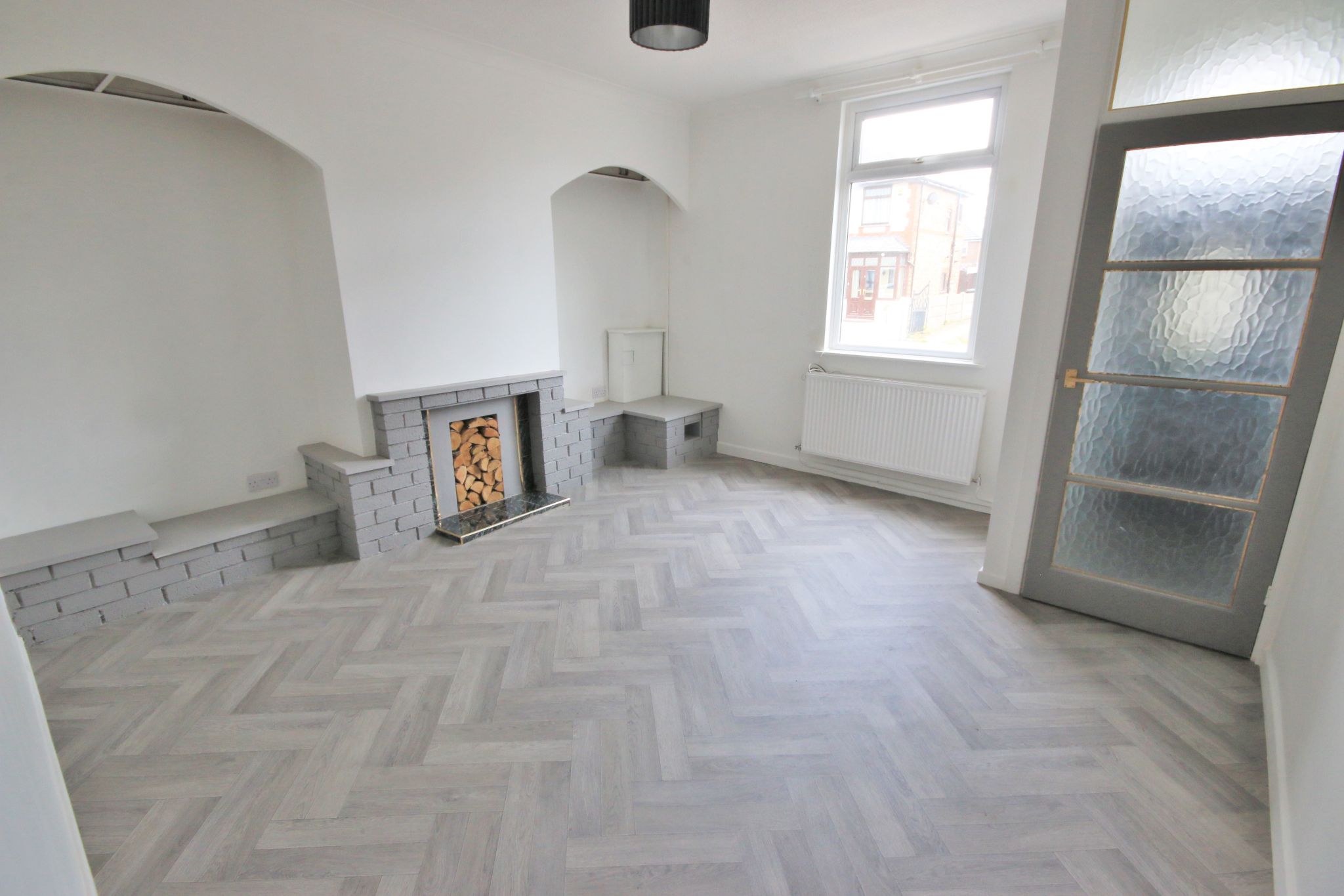 2 bedroom mid terraced house To Let in Wigan - Photograph 2.