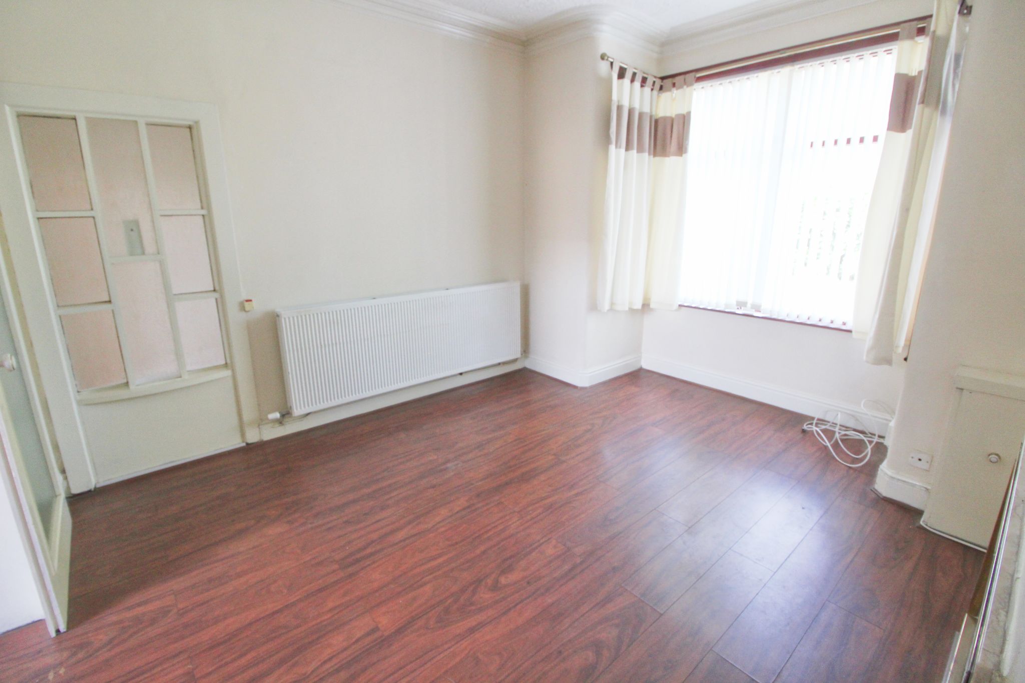 3 bedroom mid terraced house To Let in Wigan - Photograph 3.
