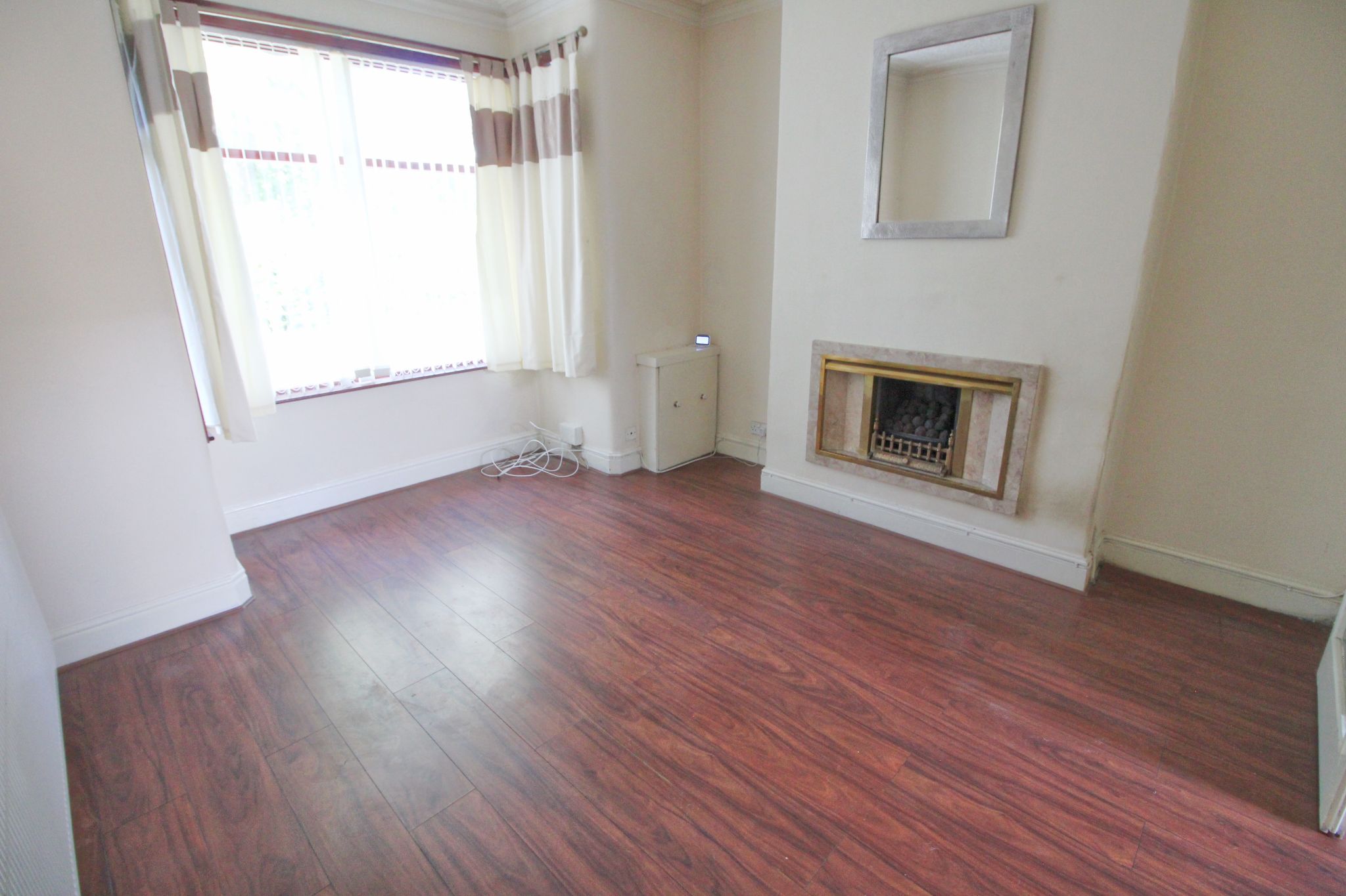 3 bedroom mid terraced house To Let in Wigan - Photograph 2.
