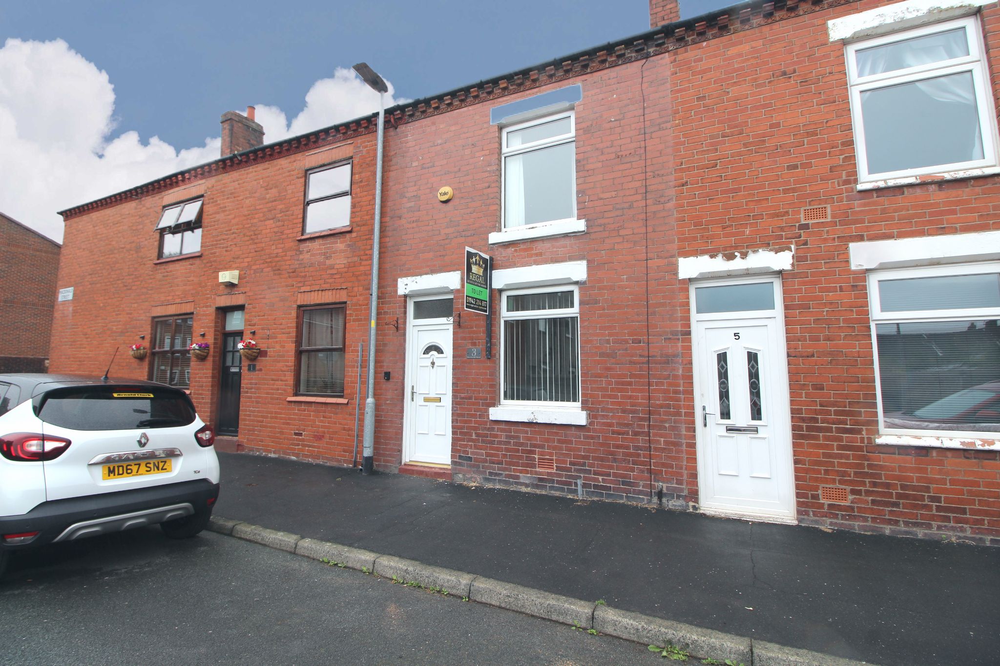 2 bedroom mid terraced house To Let in Wigan - Photograph 1.