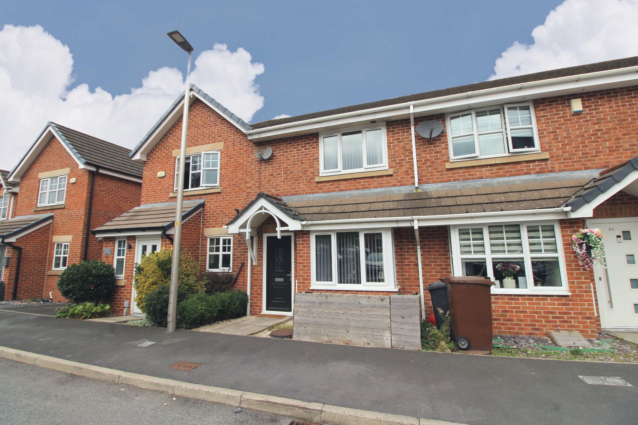 3 bedroom mid terraced house For Sale in Wigan - Photograph 1.
