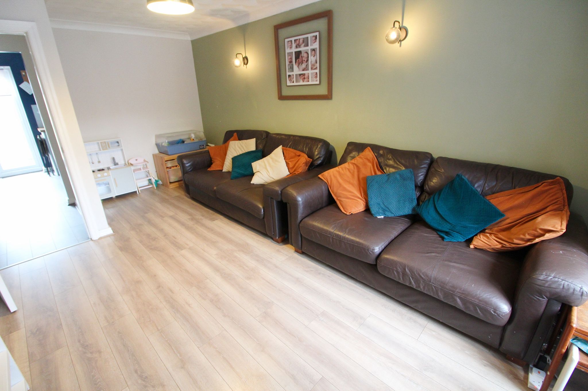 3 bedroom mid terraced house For Sale in Wigan - Photograph 1.