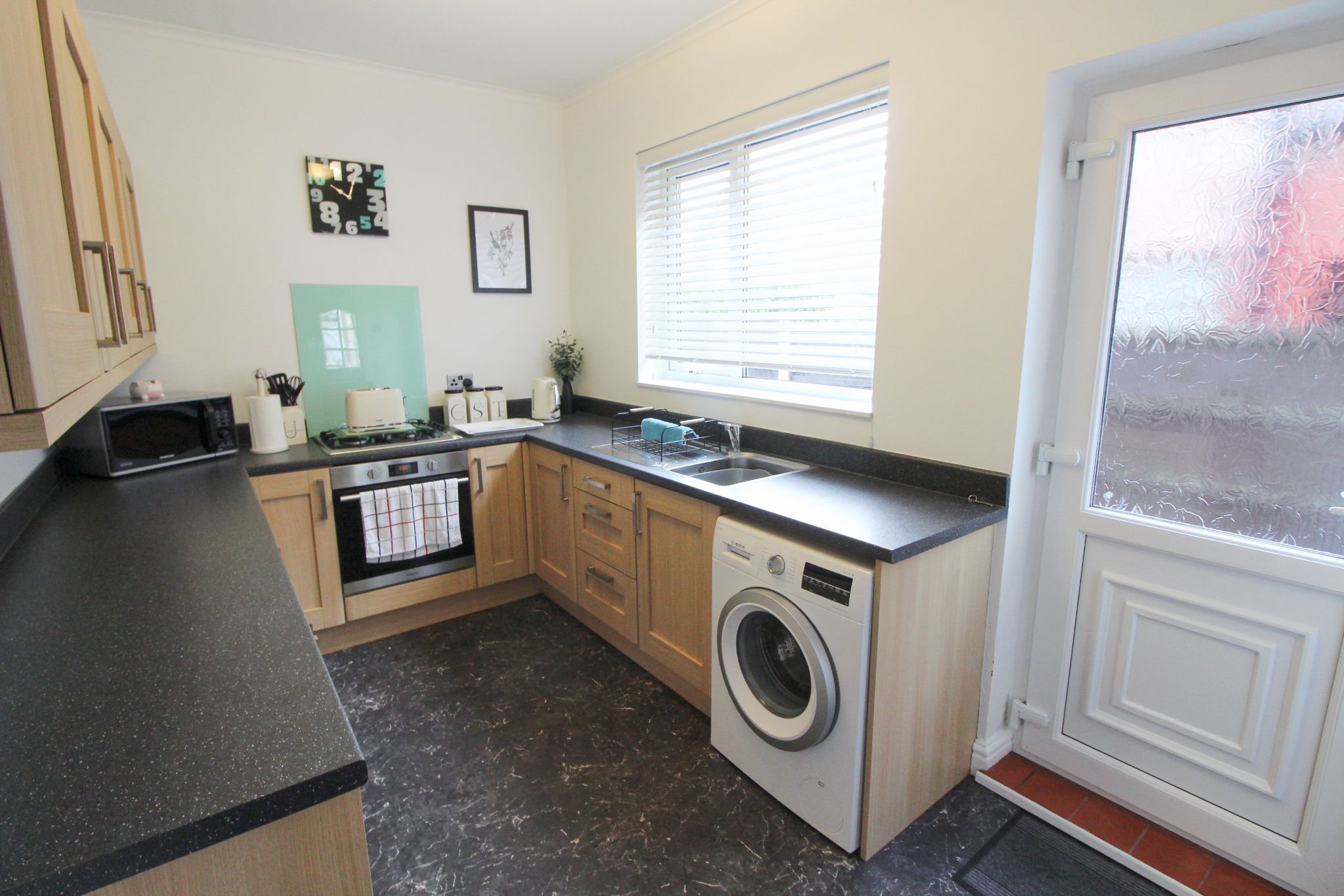 2 bedroom mid terraced house For Sale in Wigan - Photograph 8.