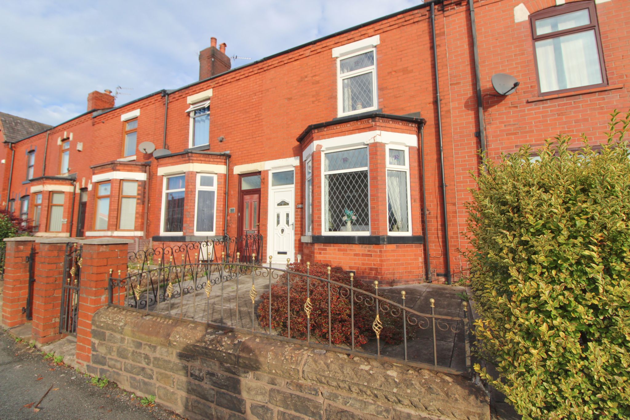 2 bedroom mid terraced house For Sale in Wigan - Photograph 1.
