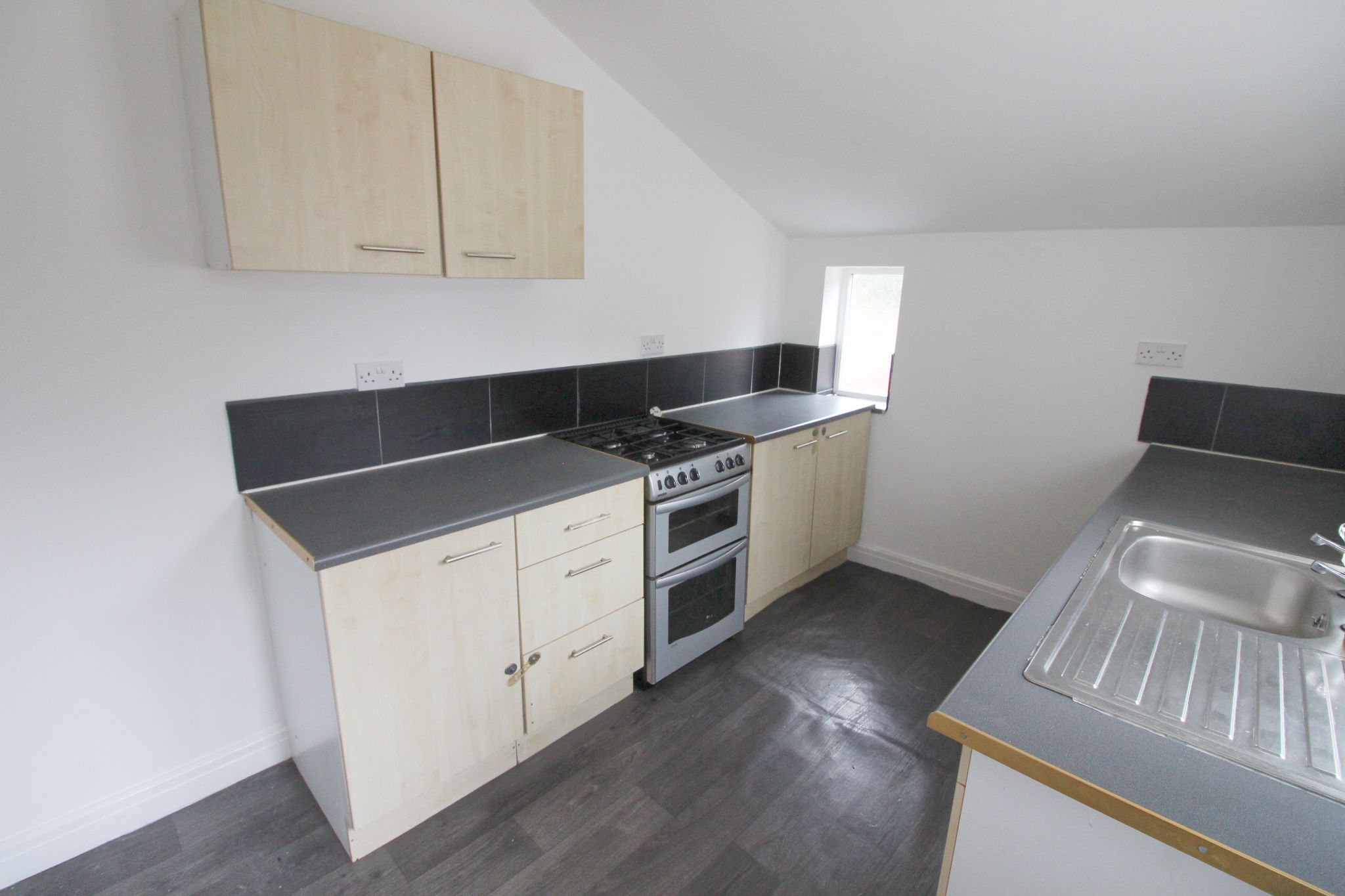 2 bedroom mid terraced house For Sale in Wigan - Photograph 8.
